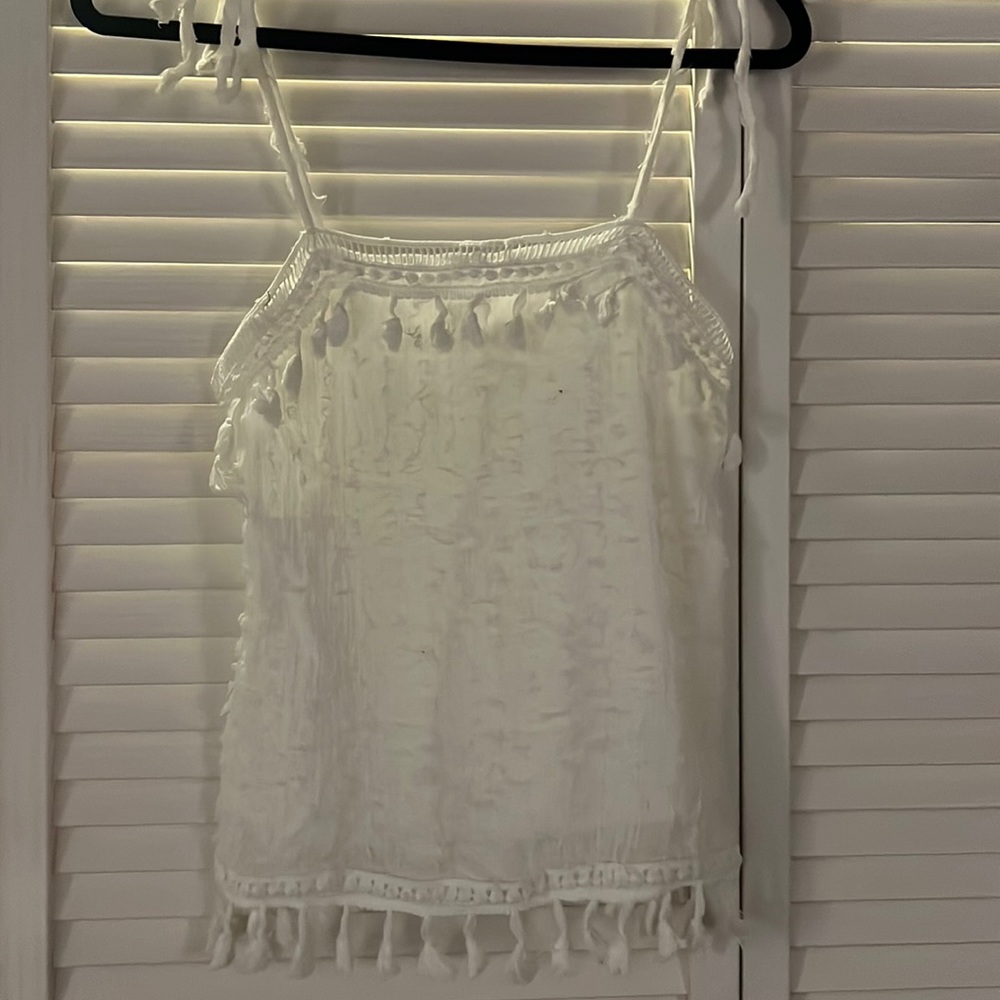 White tank with tassels